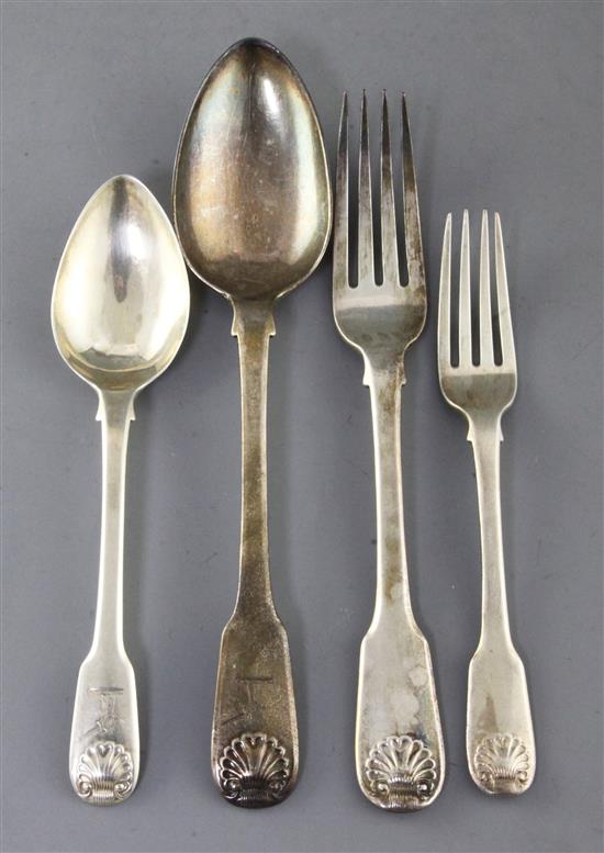 A part canteen of George III/George IV silver fiddle and shell pattern flatware by Josiah & George Piercy and George Piercy,